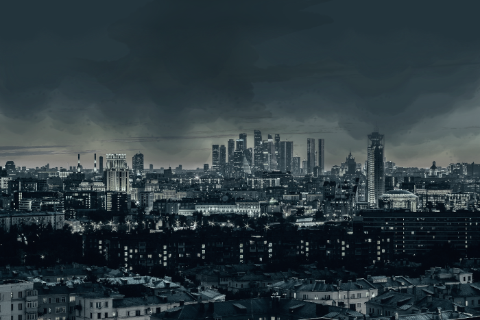 A modern city covered with smog, as a large winged shape looms overhead.